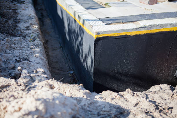 Professional Waterproofing technician working in Leesburg, VA